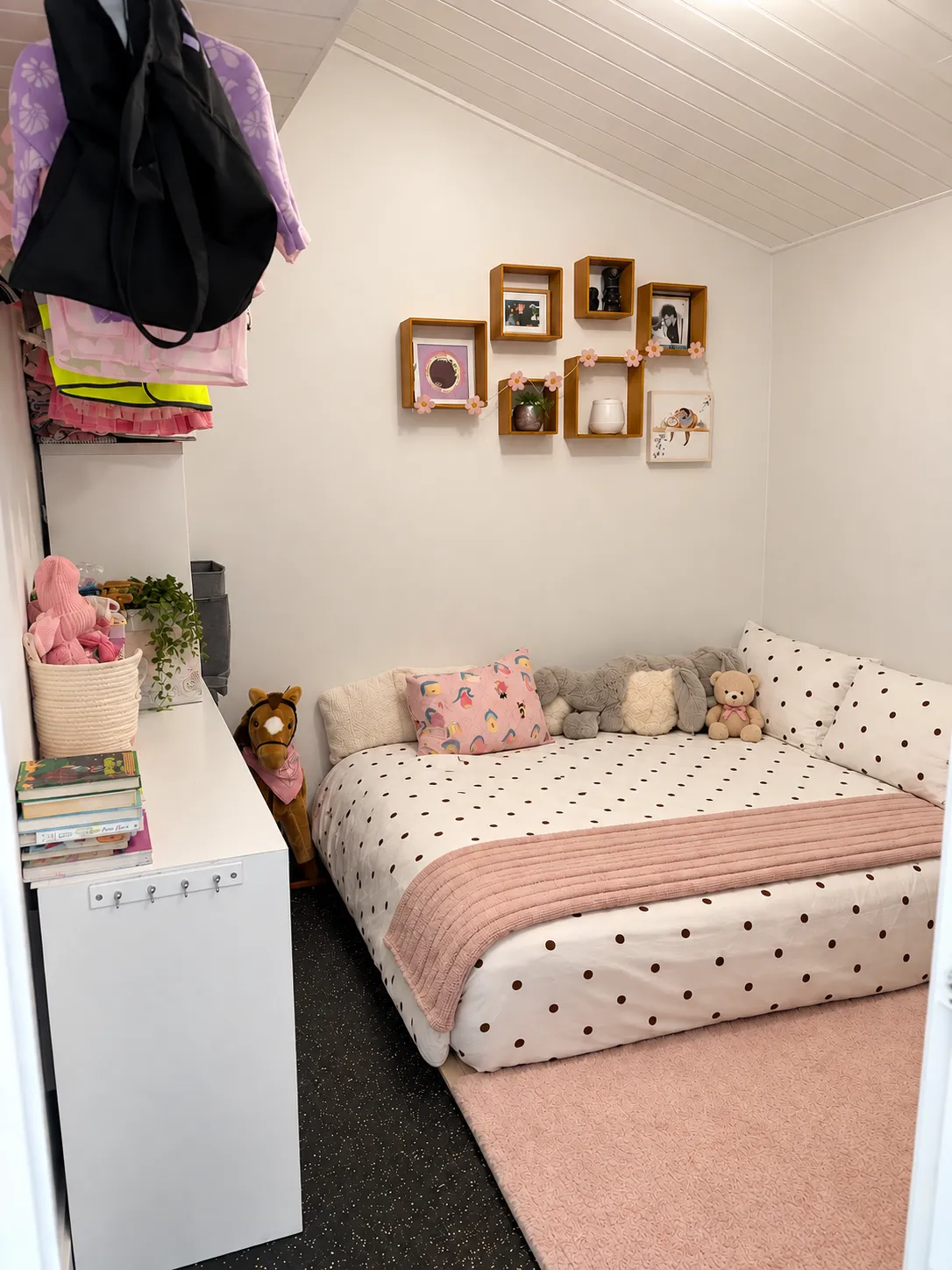 Other guest house bedroom with display shelves