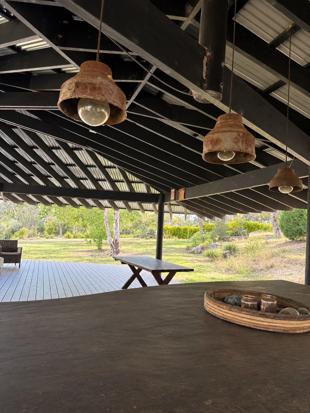 Covered dining area of the pavilion overlooking the dam