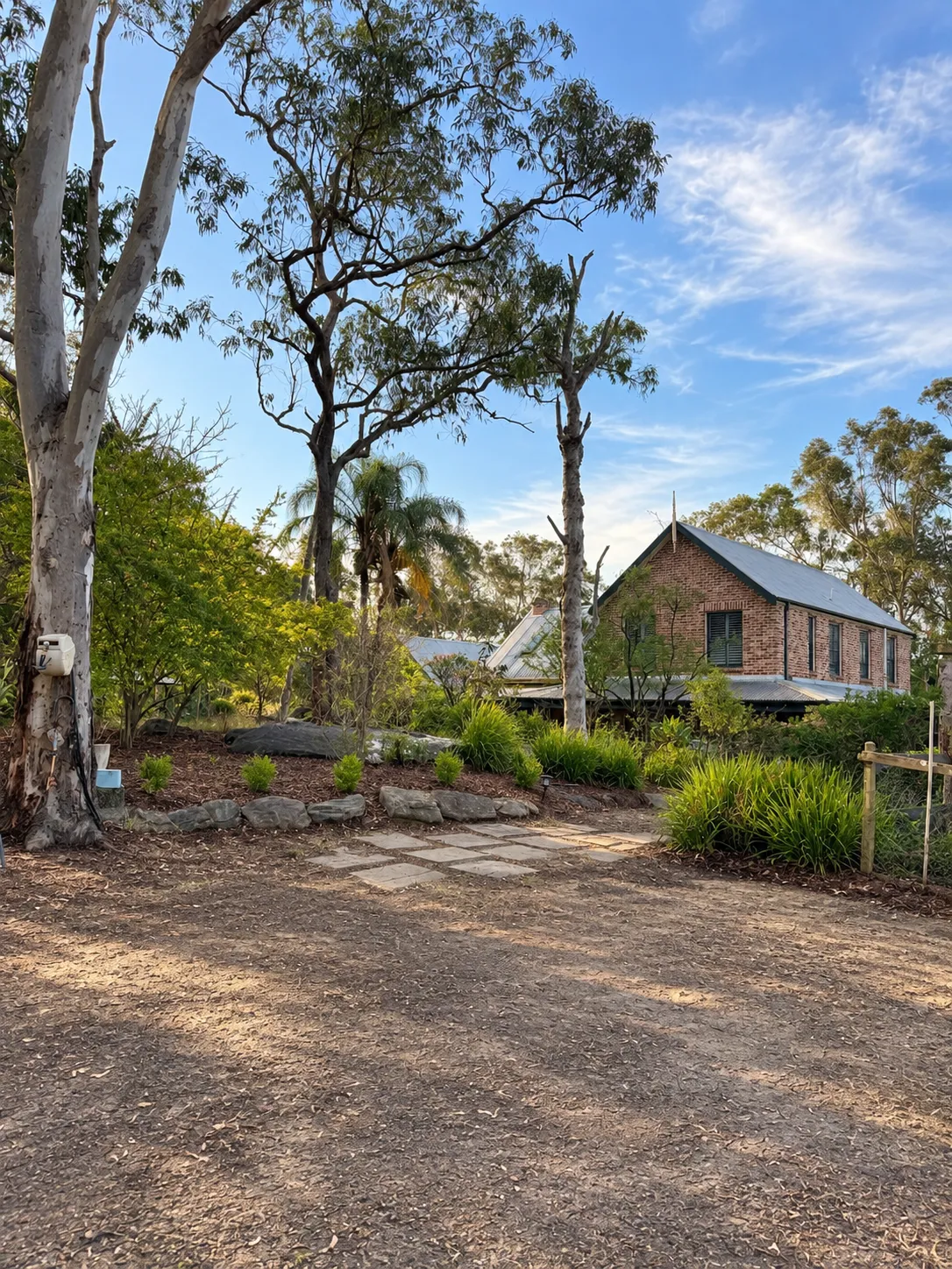 Stone steps through the garden towards the residence